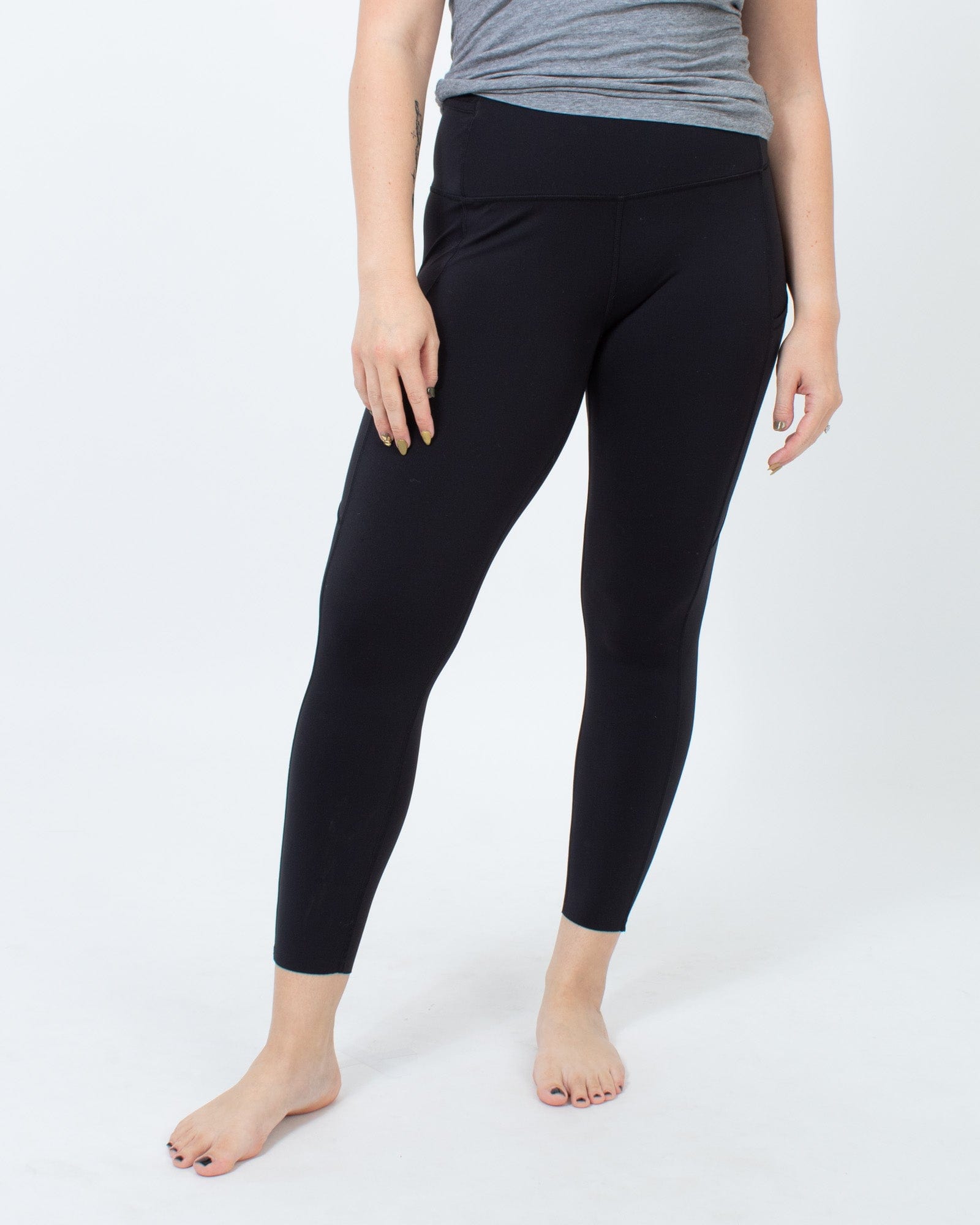 Black Lululemon Leggings with Side Pockets - The Revury