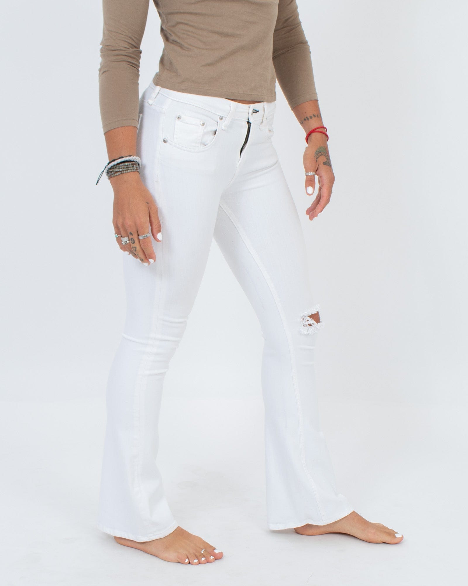White Flared Jeans The Revury1
